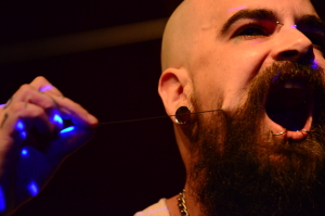 Eyeclops. Pulling the needle out hfrom his right cheek. Weirdfest at The Central, 2016.